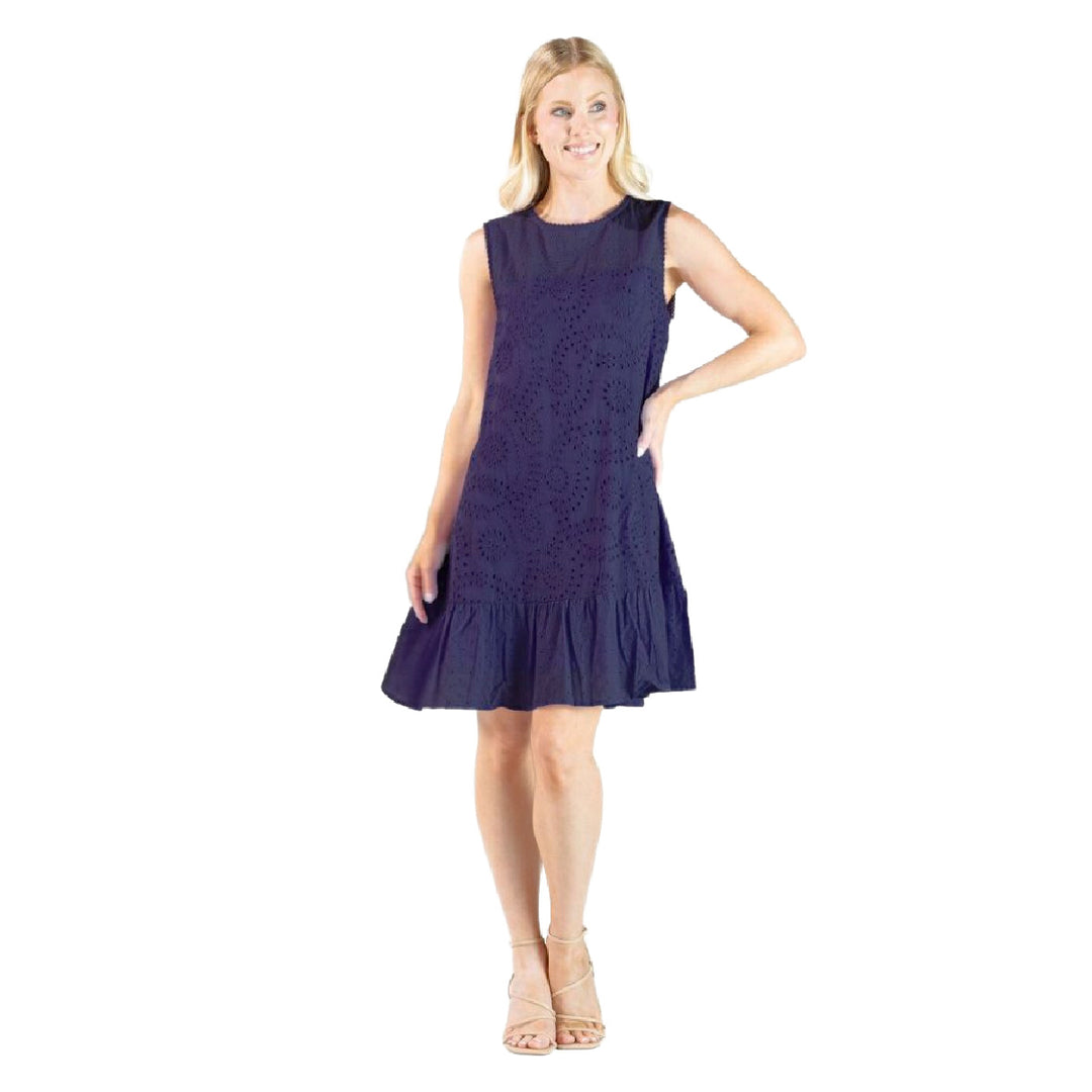 Woman wearing Simply Southern Sunday Afternoon Navy eyelet dress