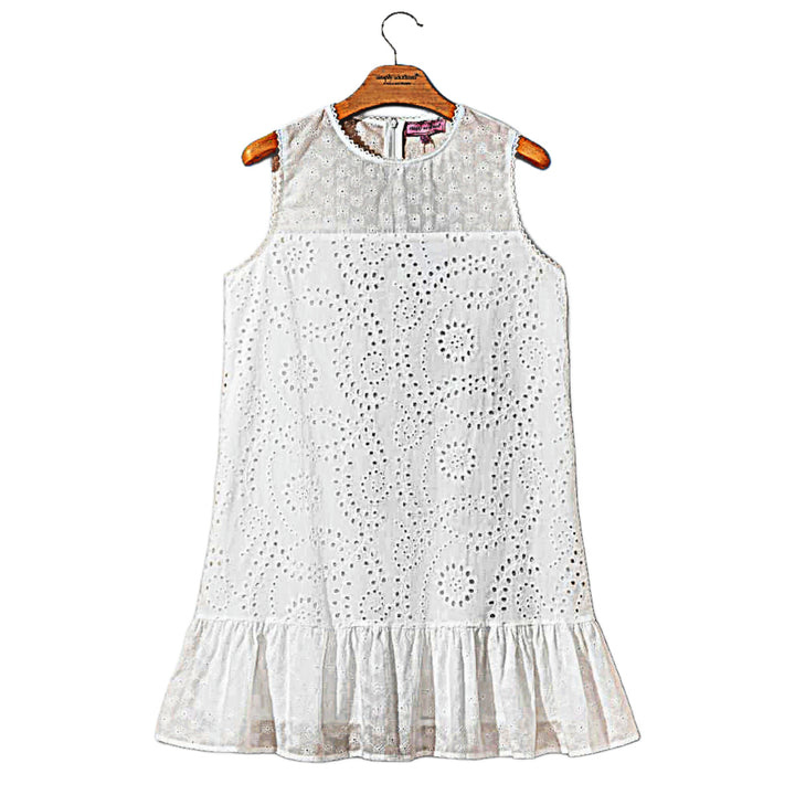Simply Southern white eyelet dress with sleeveless shift silhouette and ruffle hem