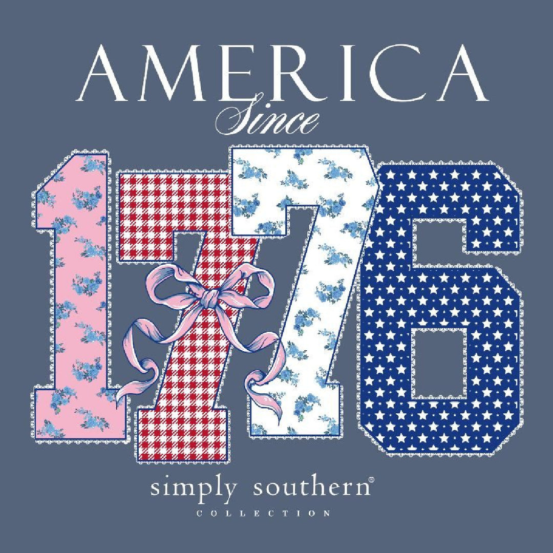 Close-up of Simply Southern 1776 graphic detail with red gingham bow and stars on USA shirt