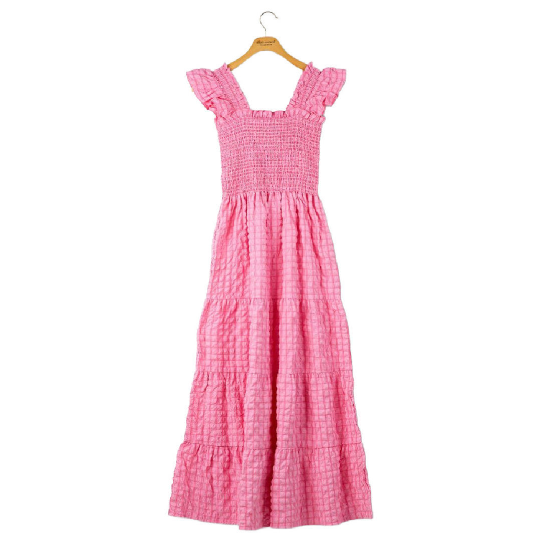 Pink maxi dress with smocked bodice, ruffle shoulders, and tiered skirt by Simply Southern