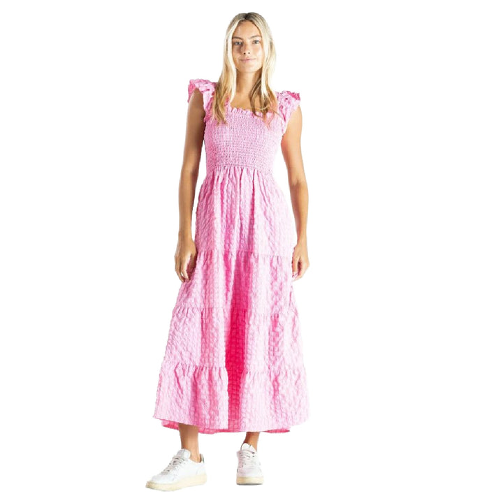 Woman wearing Simply Southern Pink Textured Ruffle Sleeve Maxi dress on a white background
