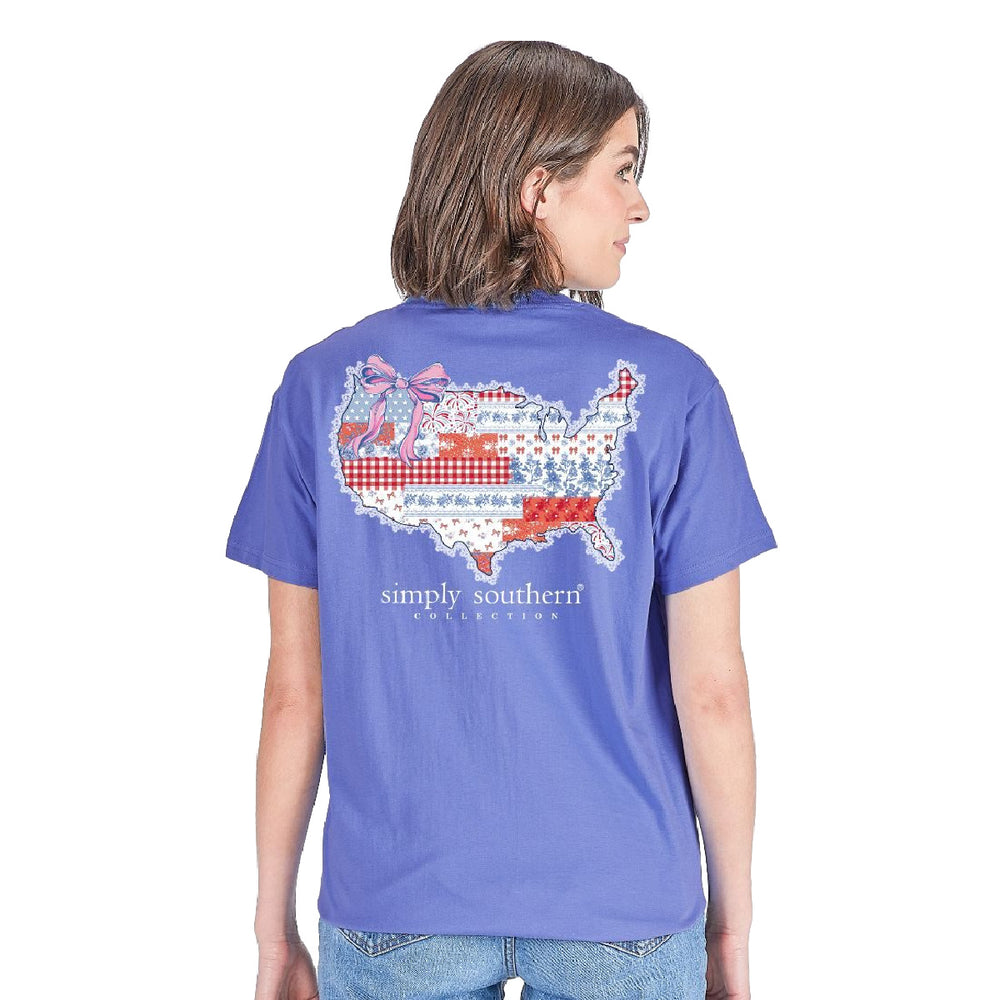 Woman wearing a Simply Southern t-shirt with a patchwork quilt map of USA